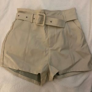 White leather shorts